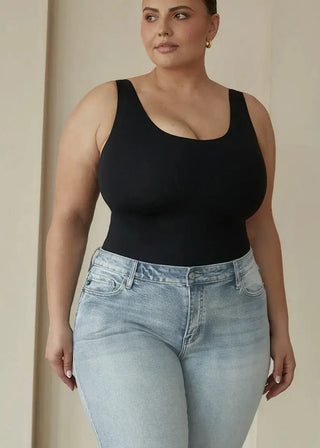 woman wearing pinsy shapewear scoop tank hourglass shapewear bodysuit in black