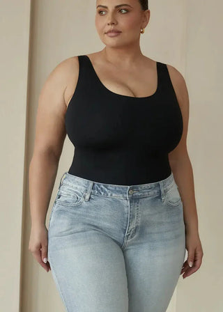 woman wearing pinsy shapewear scoop tank hourglass shapewear bodysuit in black
