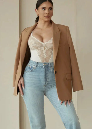 woman wearing pinsy shapewear sculpting lace hourglass shapewear bodysuit in cream