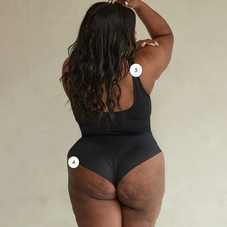 Plus size model wearing Pinsy Shapewear Black Scoop Neck Shapewear Bodysuit