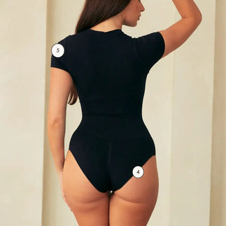 Model wearing Pinsy Shapewear short sleeve Seamless Butter Sculpt Shapewear Bodysuit