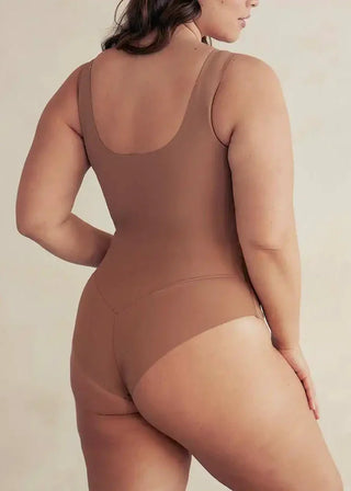 pinsy shapewear woman wearing scoop tank shapewear bodysuit in camel