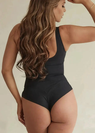 Woman Wearing Pinsy Shapewear Spaghetti Hourglass Shapewear Cheeky Bodysuit in Black