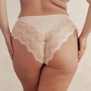 Woman wearing Pinsy Shapewear Mid-Waist Smoothing Beige Lace Hipster Panty