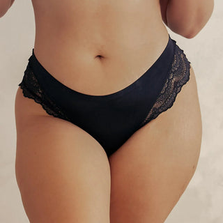 Woman wearing Pinsy Shapewear Black Lace Thong Panty