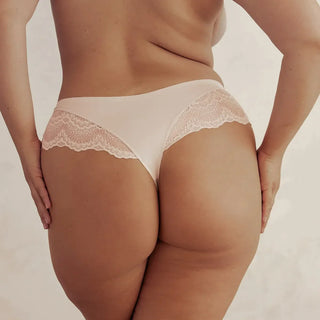 Woman wearing Pinsy Shapewear Beige Lace Thong Panty