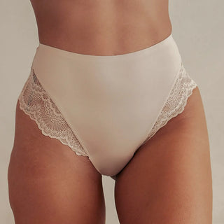 Woman wearing Pinsy Shapewear High-Waist Smoothing Beige Lace Hipster Panty