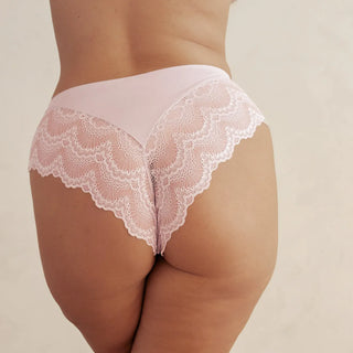 Woman wearing Pinsy Shapewear Mid-Waist Smoothing Pink Lace Hipster Panty